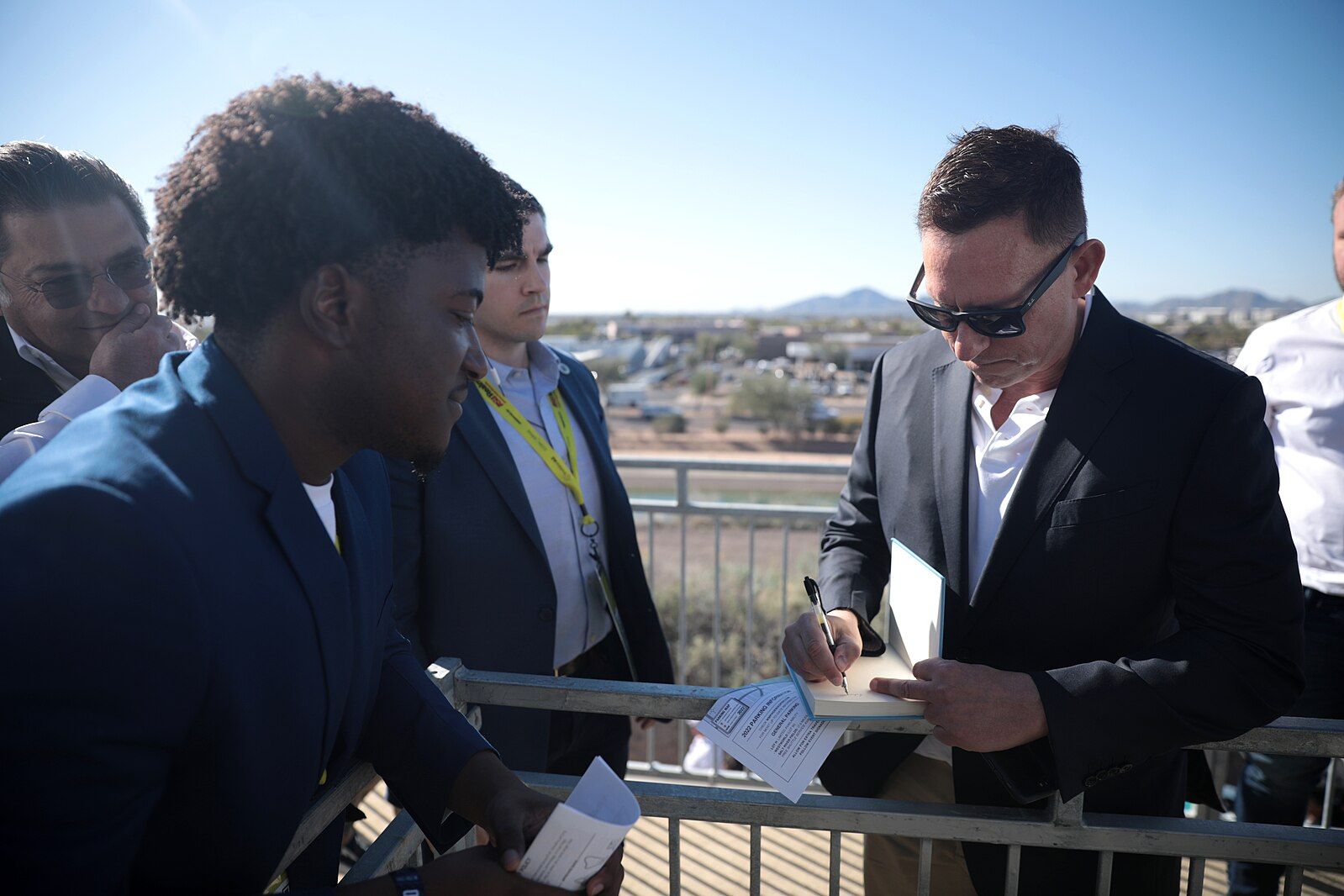 Peter Thiel signing his books for attendees at the 2022 Converge Tech Summit at The Waste Management Phoenix Open at the Skybar at TPC Scottsdale in Scottsdale, Arizona. (Photo by Gage Skidmore from Surprise, AZ, United States of America)